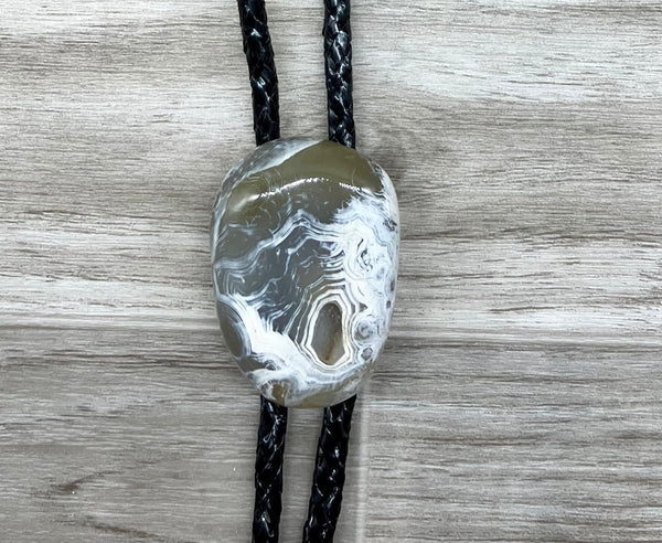 Brown & White (small pit) Stone Bolo Tie w/Braided Black Cord
