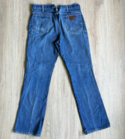 Vintage 90s Wrangler 945NAV Faded Blue Relaxed Western Cowboy Cut Jeans (34x32)
